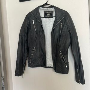 Gray faux leather jacket with ribbing detail and silver zippers